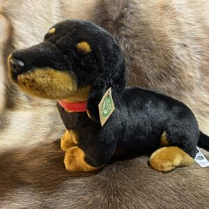 7e0db9f2-daff-47a9-a347-7a80cb96d905 Taks, punase rihmaga (32 cm)